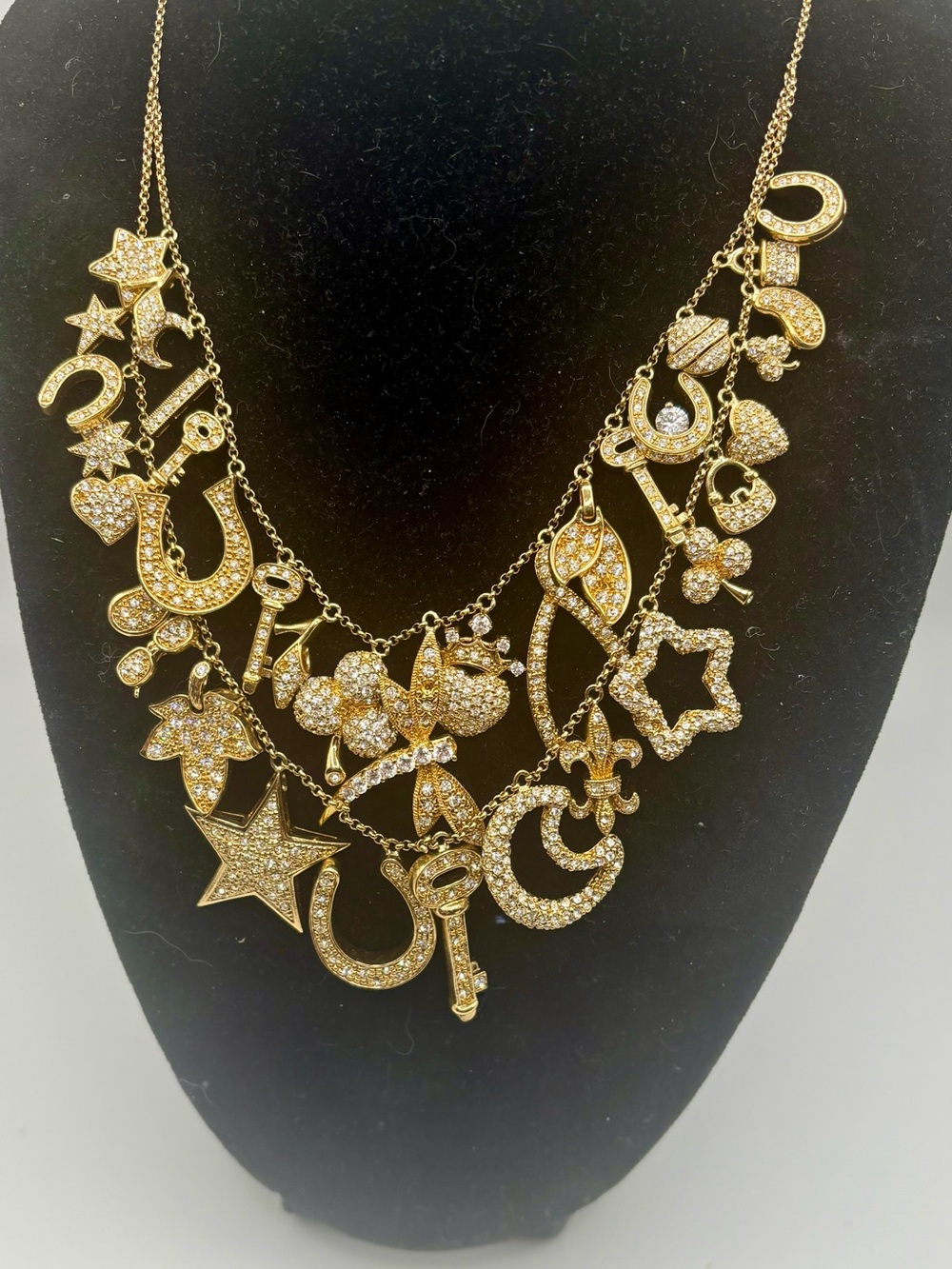 Gold Tone Crystal Pavé Multi Charm Statement Necklace Horseshoe Key Star